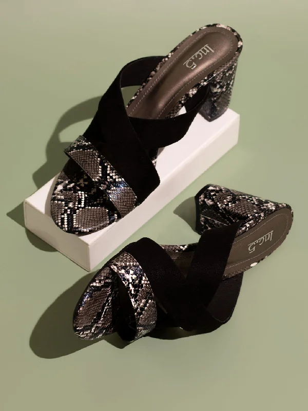 High-heeled sandals for women with cross-strap design and open-toe look for evenings-Women Black & White Snake Skin Printed Block Heels