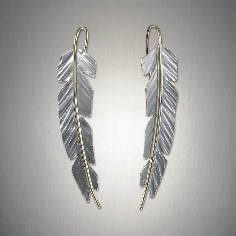 Hoop earrings with crescent moon shapes for a celestial and mystical appearance-2915 - Feather