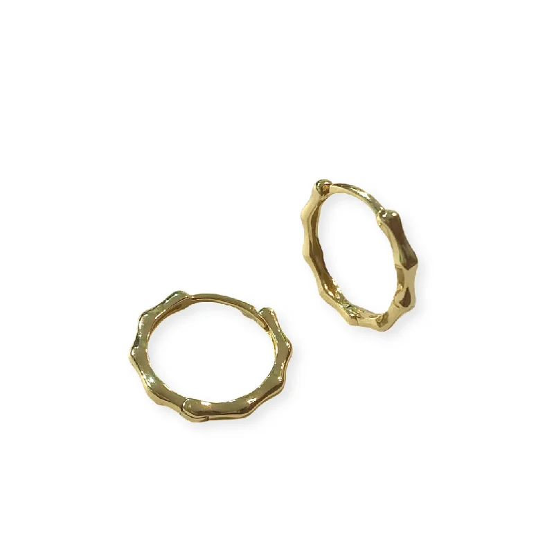 Best hoop earrings with asymmetrical designs for a fashion-forward, avant-garde look-Noellery Bamboo Texture Wavy Huggies