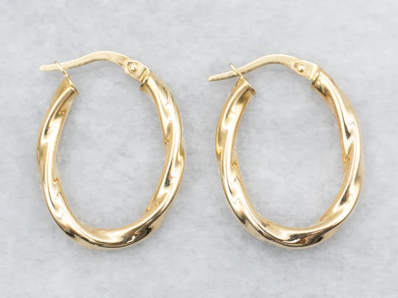 Best hoop earrings with baroque pearls for a luxurious and elegant vibe-Oval Gold Twist Hoop Earrings