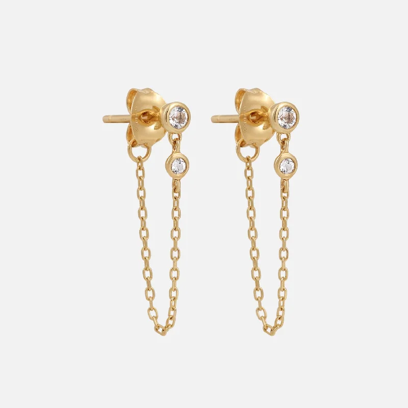 Best hoop earrings with blackened metal for an edgy and bold appearance-Solid Gold White Topaz Dangle Chain Huggies