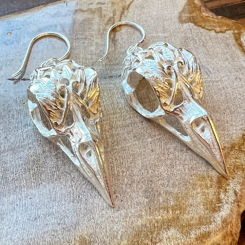 Hoop earrings with infinity loop designs for a continuous and eternal shape-<span>ASES-217<span>: </span></span>Silver Ravens - Silver Posts